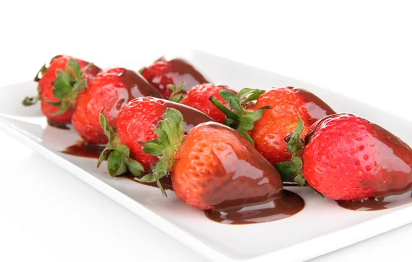 Strawberry dipped in chocolate fondue isolated on white — Stock Photo, Image