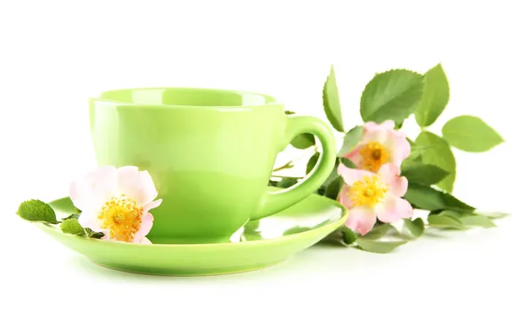 Bitkisel çay ile üzerine beyaz izole hip gül çiçek — Stok fotoğraf