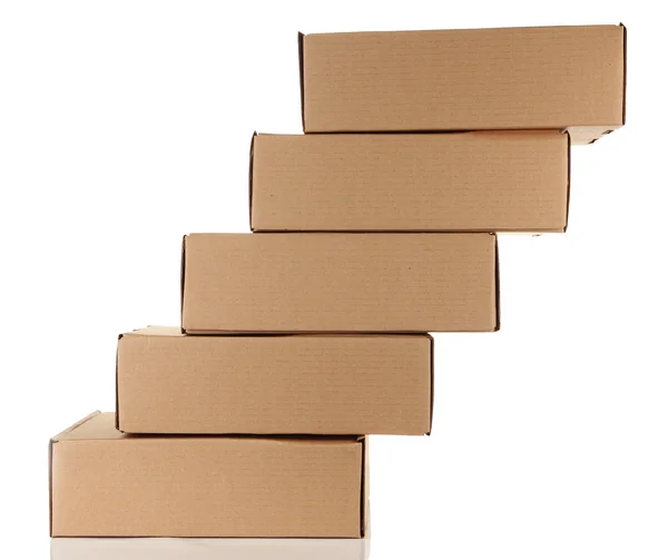 Пакетні коробки, ізольовані на білому — стокове фото