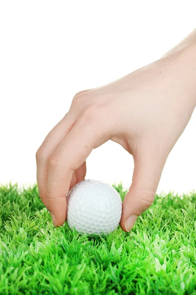 Γκολφ μπάλα στο χέρι που απομονώνονται σε λευκό — Φωτογραφία Αρχείου