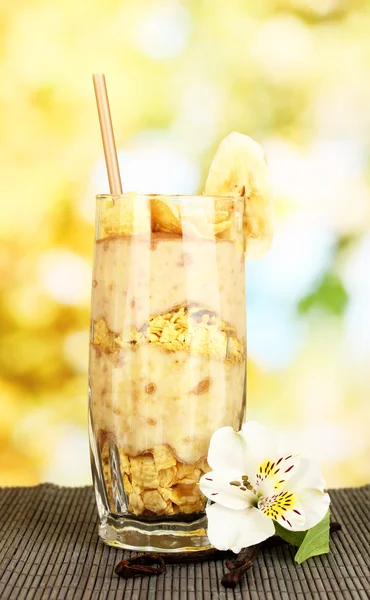 Delicious fruit smoothie on bright background — Stock Photo, Image