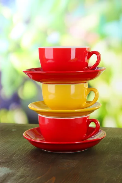 Three cups on nature background — Stock Photo, Image