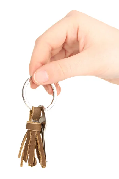 Key with leather trinket in hand isolated on white — Stock Photo, Image