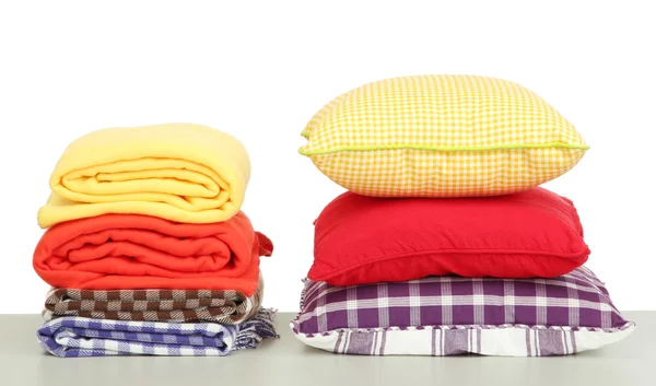 Bright pillows and plaids, isolated on white — Stock Photo, Image
