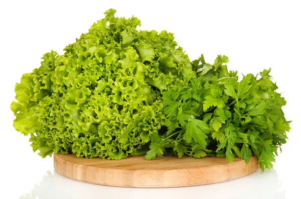 Useful herbs on wooden cutting board isolated on white — Stock Photo, Image