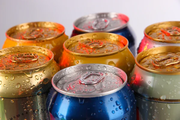 Metal tins on gray background — Stock Photo, Image