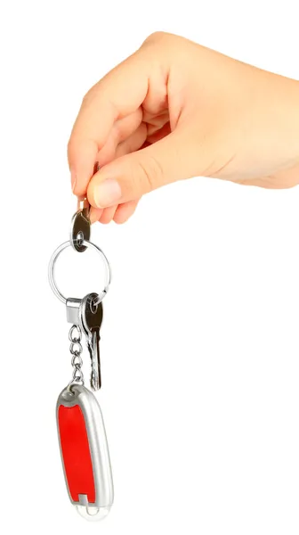 Sleutelhanger met huis sleutels in hand geïsoleerd op wit — Stockfoto