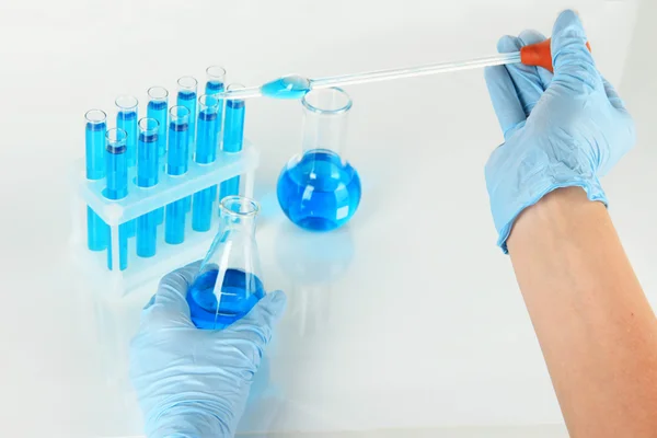 Scientist working at laboratory isolated on white — Stock Photo, Image