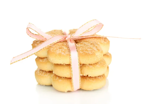 Sladké sušenky s růžovou stuhou izolovaných na bílém — Stock fotografie