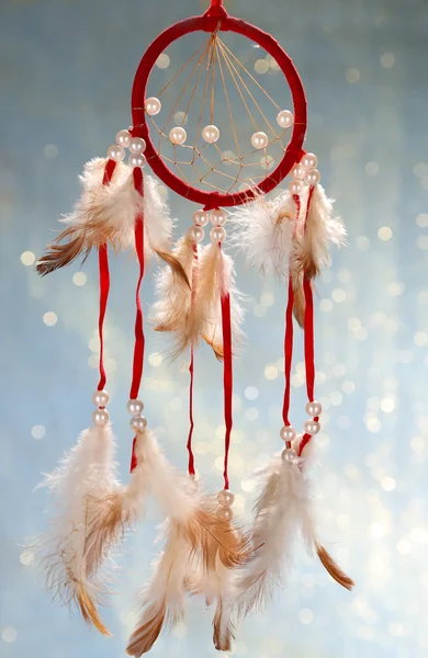 Beautiful dream catcher on blue background with lights — Stock Photo, Image