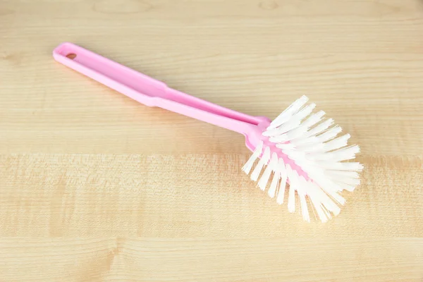 Toilet brush on wooden background — Stock Photo, Image