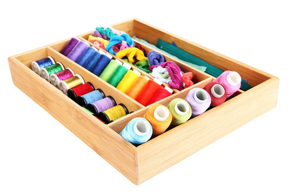 Colorful threads for needlework in wooden box isolated on white — Stock Photo, Image