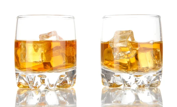 Brandy glasses with ice isolated on white — Stock Photo, Image