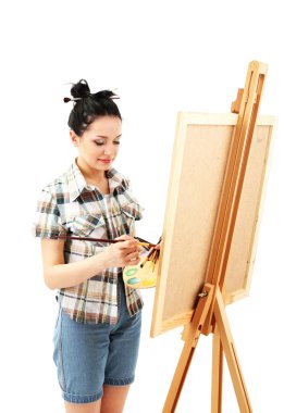 güzel bir genç kadın ressam üzerine beyaz izole iş başında