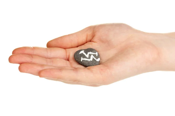 Fortune telling with symbols on stone in hand isolated on white — Stock Photo, Image