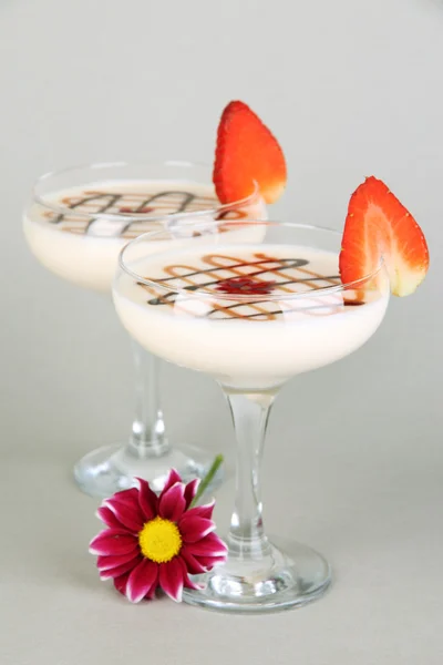 Fruit smoothies on grey background — Stock Photo, Image