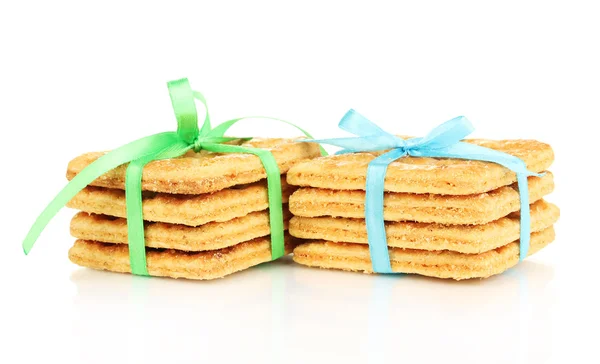 Galletas dulces atadas con cintas de colores aisladas en blanco —  Fotos de Stock