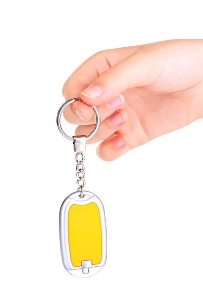 Keychain in hand isolated on white — Stock Photo, Image