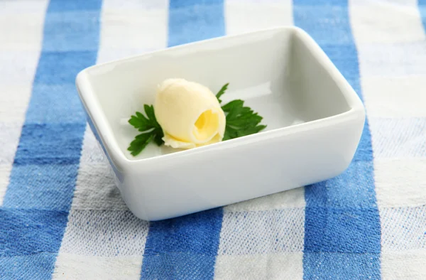 Butter curl on plate, close up — Stock Photo, Image