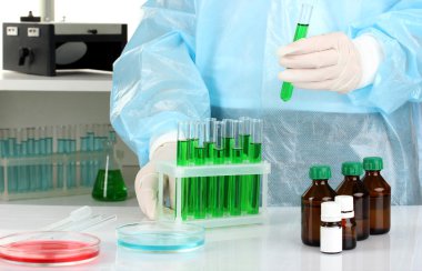 Scientist conducting research in laboratory close up clipart