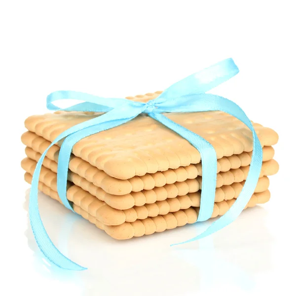 Sladké sušenky s modrou stužkou izolované na bílém — Stock fotografie