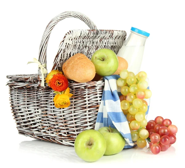 Picnic basket with fruits and bottle of milk, isolated on white — Stock Photo, Image