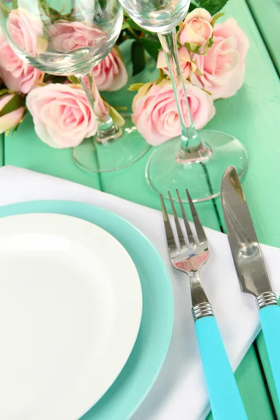 Table serving on a wooden background — Stock Photo, Image