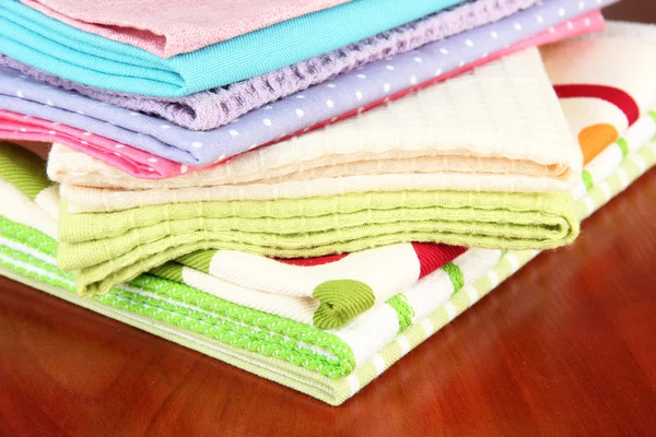 Kitchen towels, on wooden background — Stock Photo, Image