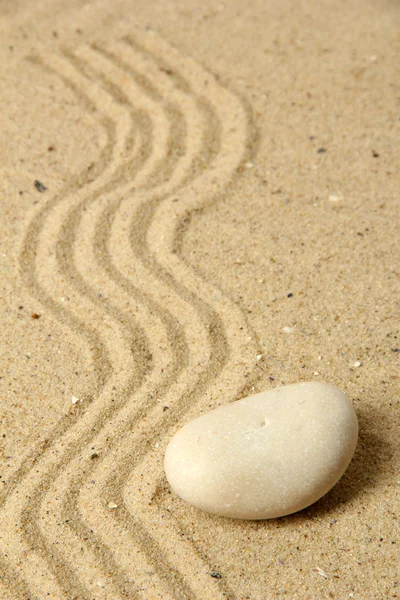 Zen garden with raked sand and stone close up — Stock Photo, Image
