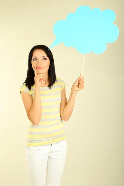 Thought girl in bubble next to it on grey background — Stock Photo, Image