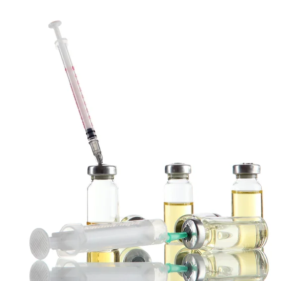 Medical bottles and syringes isolated on white — Stock Photo, Image