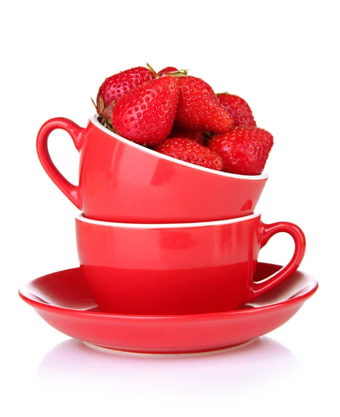 Ripe sweet strawberries in red cups, isolated on white — Stock Photo, Image