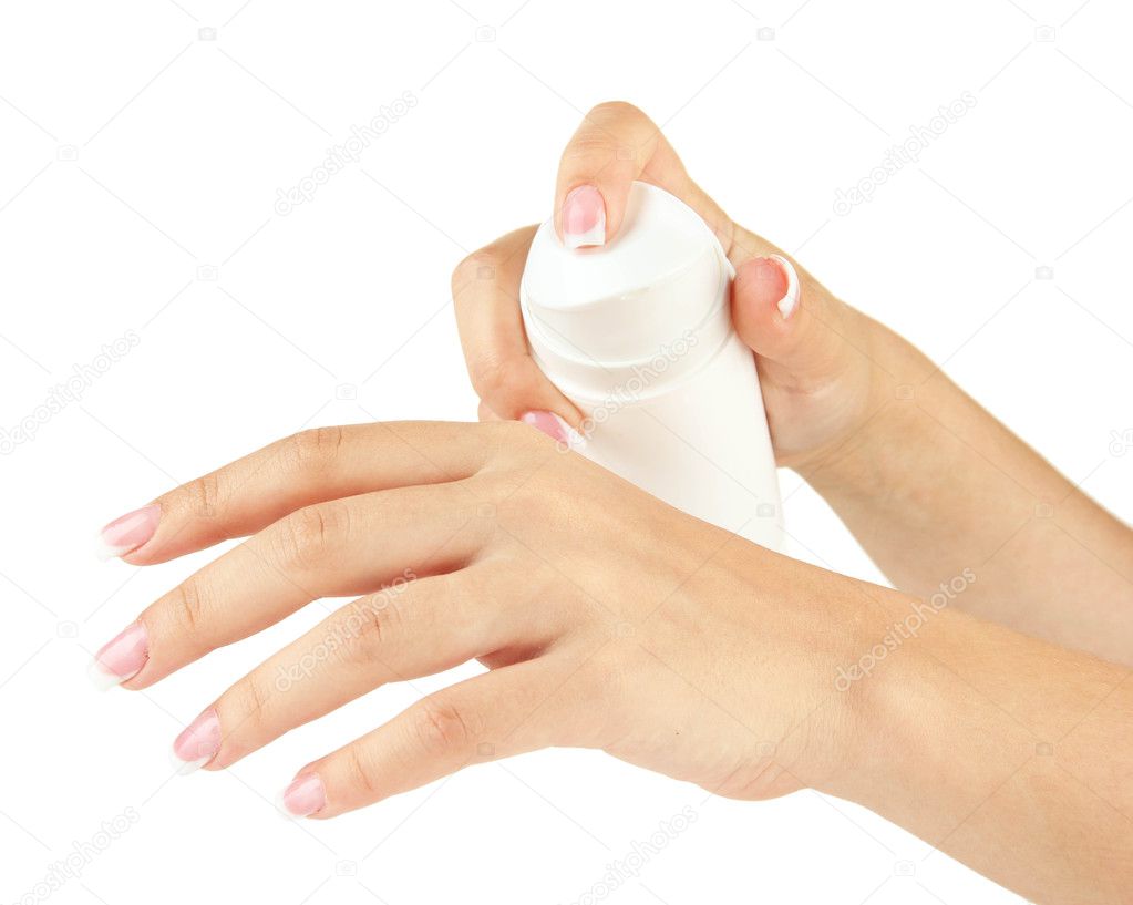 Woman applying cream on hands, isolated on white