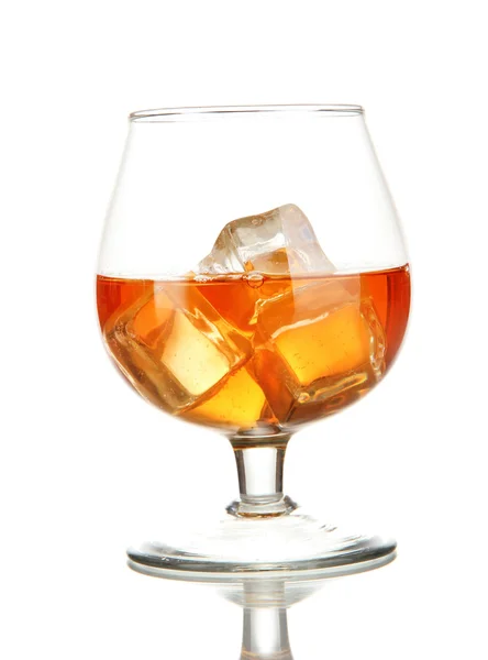 Brandy glass with ice isolated on white — Stock Photo, Image