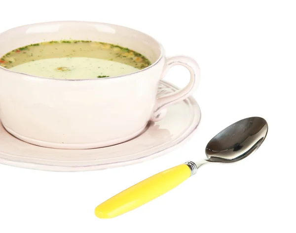 Nahrhafte Suppe mit Gemüse in der Pfanne isoliert auf weiß — Stockfoto