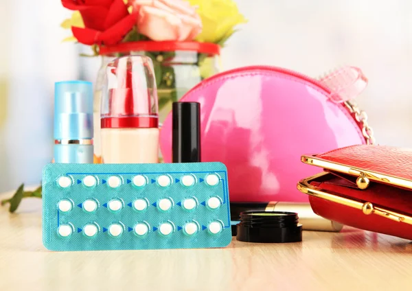 Hormonal pills in women's bedside table on room background — Stock Photo, Image