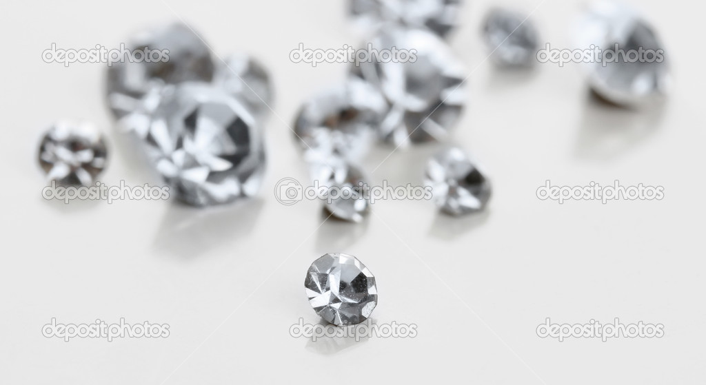 Beautiful shining crystals (diamonds), isolated on white