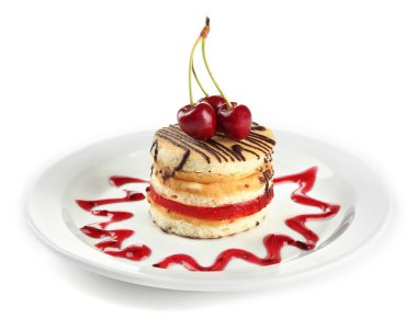 plaka üzerinde beyaz izole lezzetli bisküvi pastası