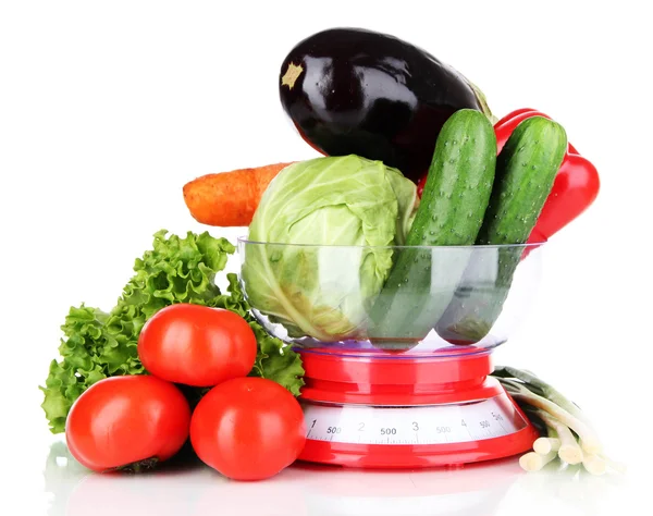 Fresh vegetables in scales isolated on white — Stock Photo, Image