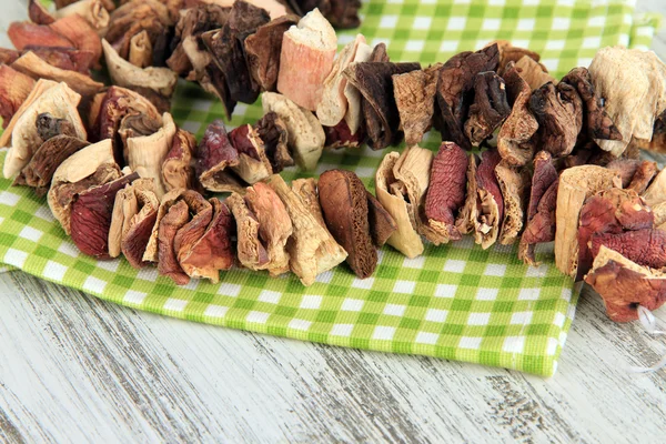 Dried mushrooms on wooden background — Stock Photo, Image