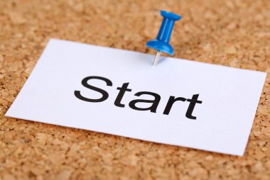 word başlangıç mantar pano ile kağıt üzerinde itme