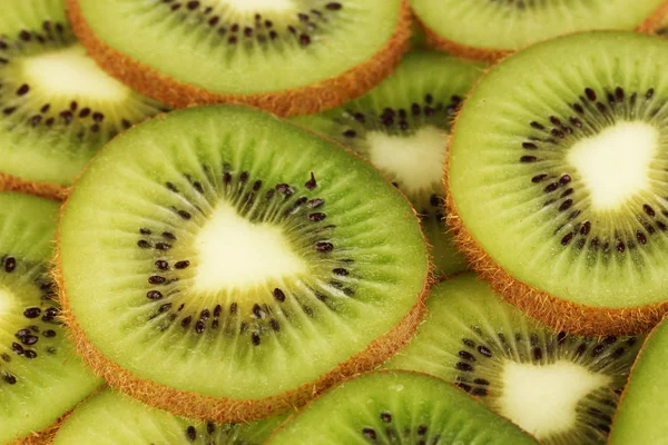 Kiwi segmenten achtergrond — Stockfoto