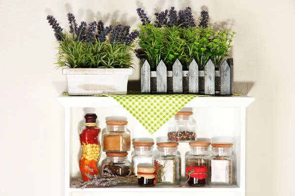 Variety spices on kitchen shelves — Stock Photo, Image