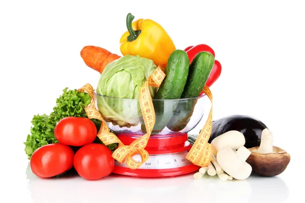 Fresh vegetables in scales isolated on white — Stock Photo, Image