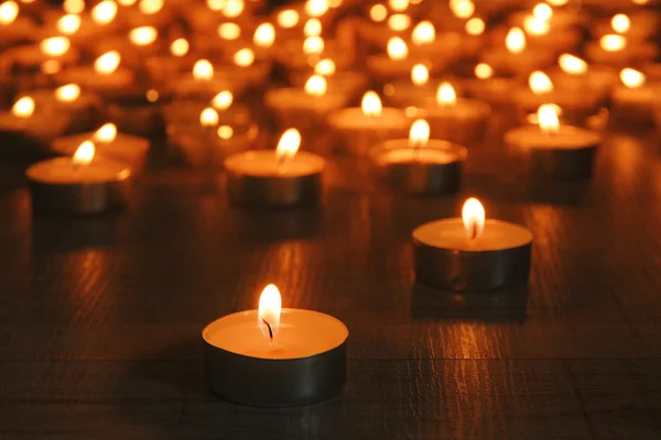 Burning candles on dark background — Stock Photo, Image