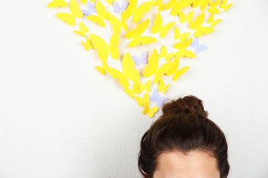 Paper yellow butterflies fly thoughts out of head clipart