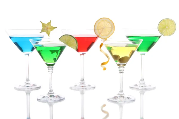 Alcoholic cocktails in martini glasses isolated on white — Stock Photo, Image