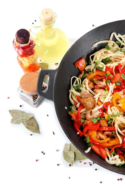 Noodles with vegetables on wok isolated on white — Stock Photo, Image