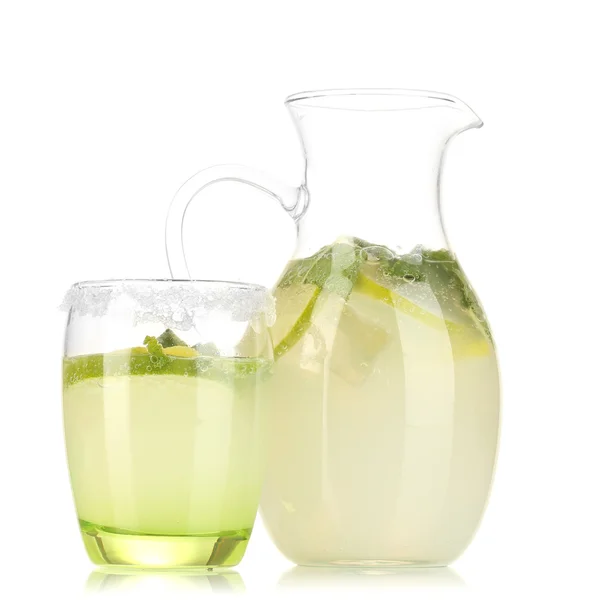 Lemonade in pitcher and glass isolated on white — Stock Photo, Image