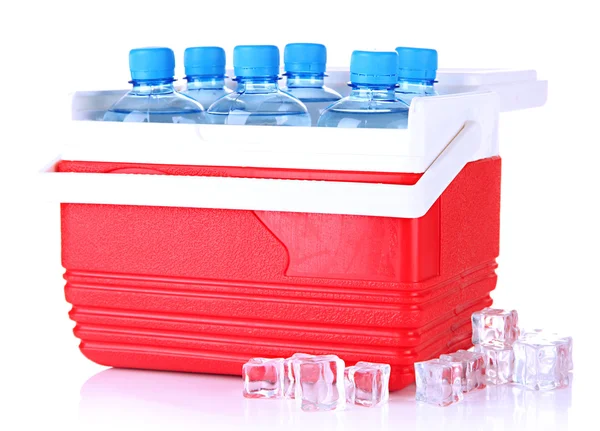 Traveling refrigerator with bottles of water and ice cubes, isolated on white — Stock Photo, Image